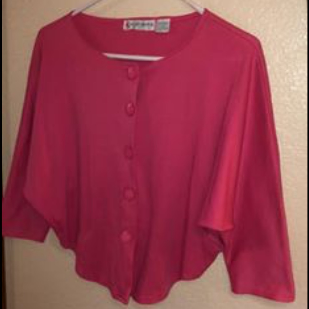 Pink 80’s cardigan.